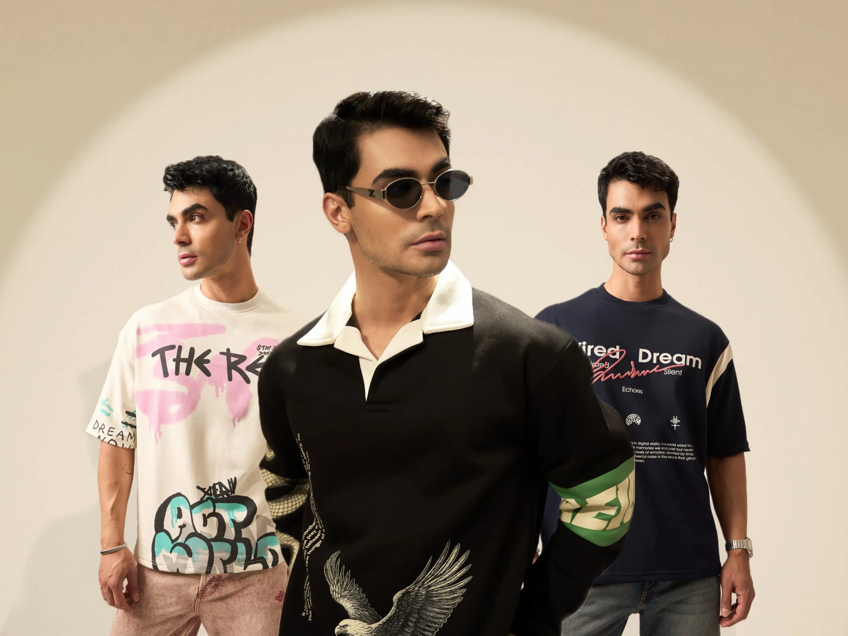 Three men wearing stylish clothing with visible brand designs against a neutral background